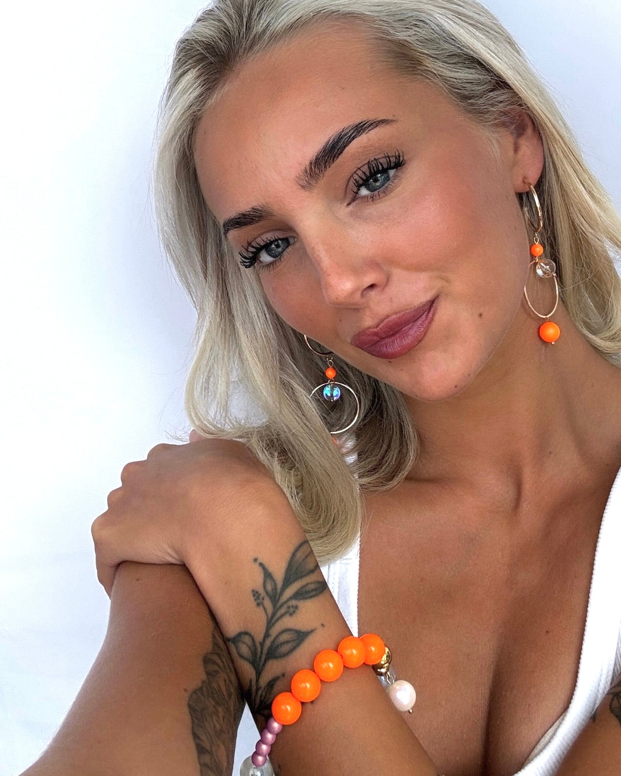 Suki neon orange pop Crystal hoop earrings