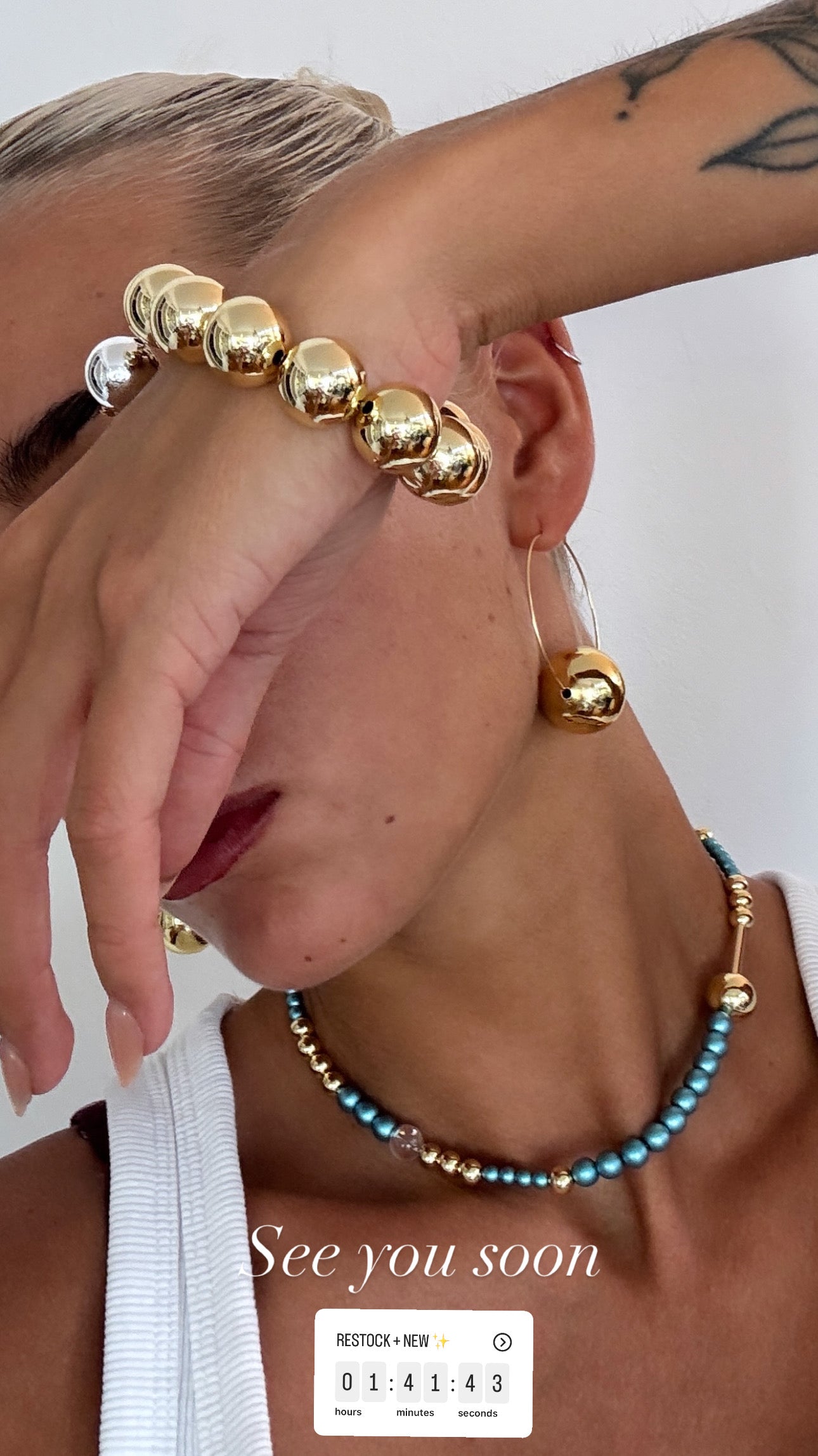 Laura Lee large gold ball hoops