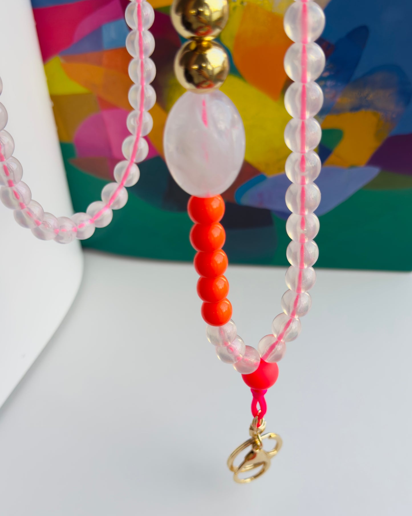 Dolly dot neon orange + bubblegum ppink cross body phone strap