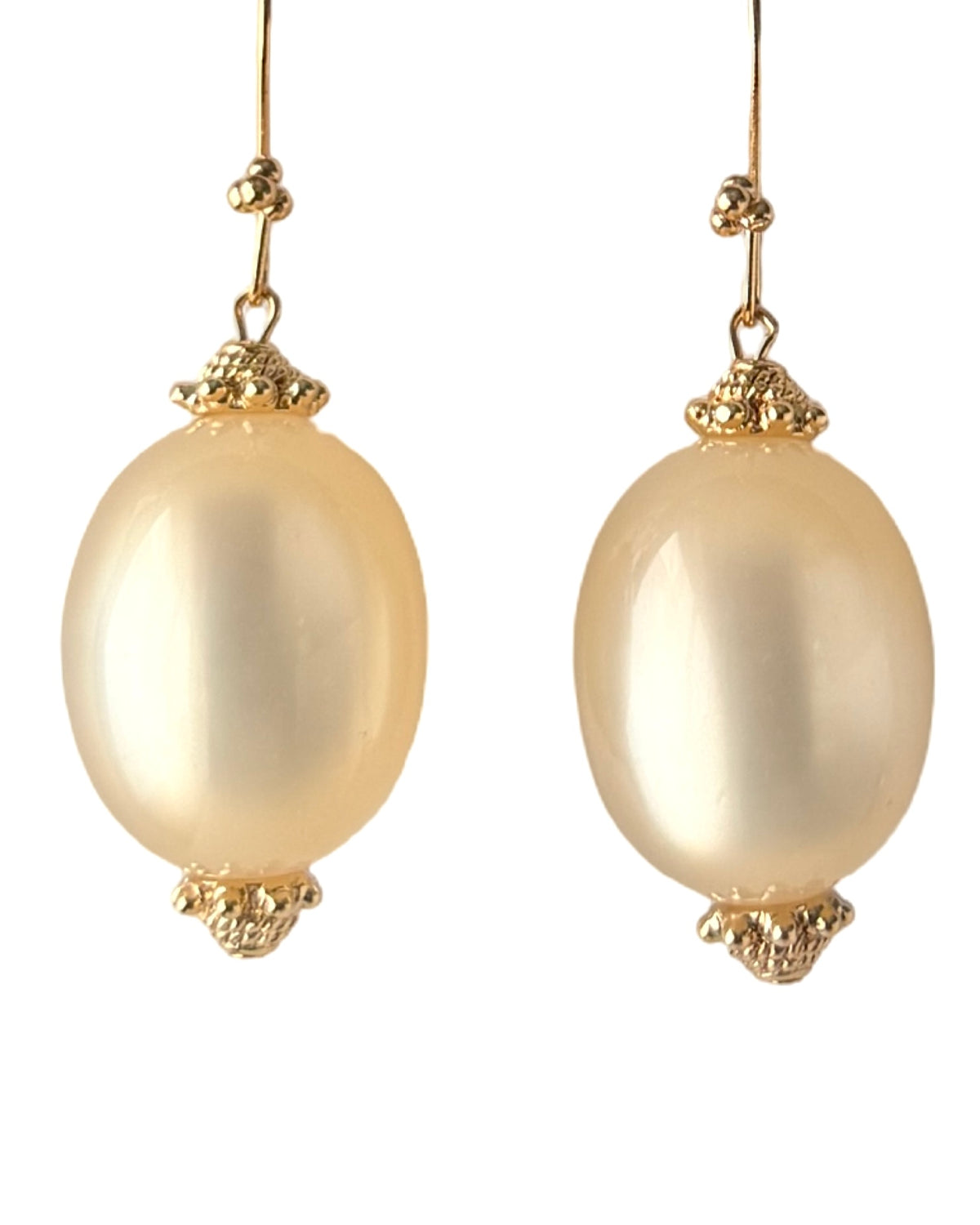 The duchess iridescent lucite cream drop pearl earrings