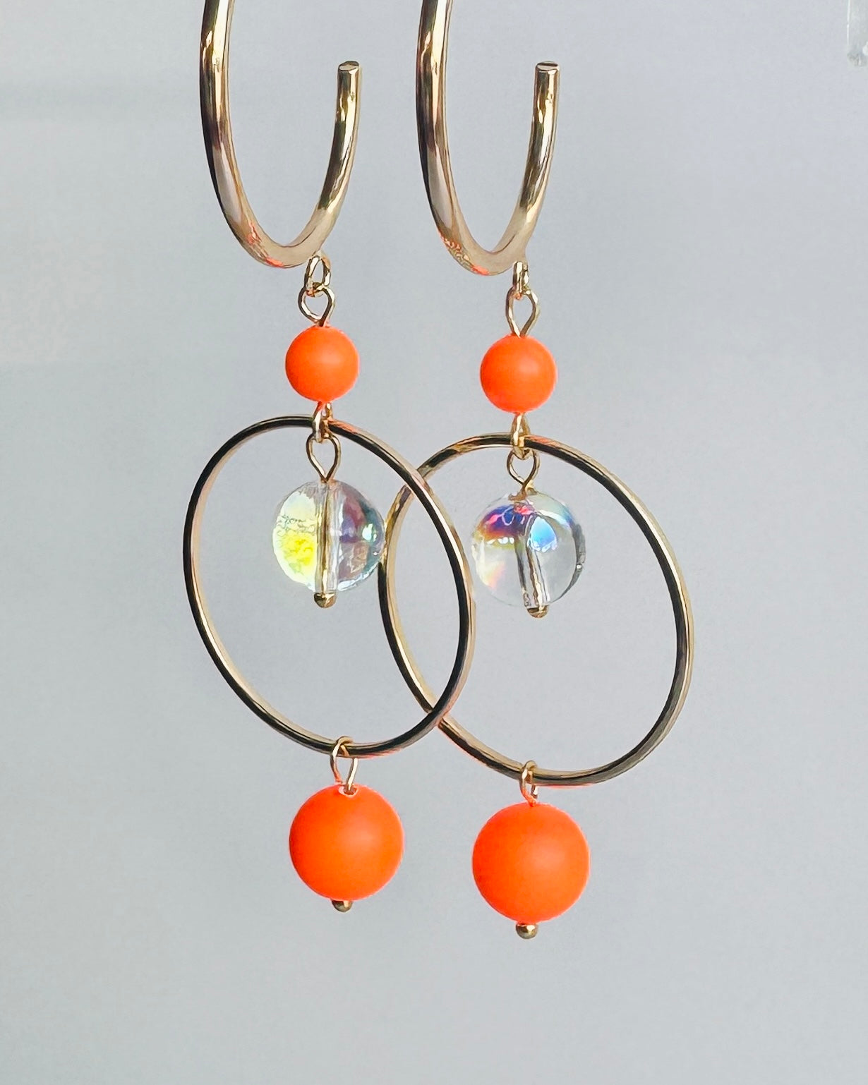 Suki neon orange pop Crystal hoop earrings