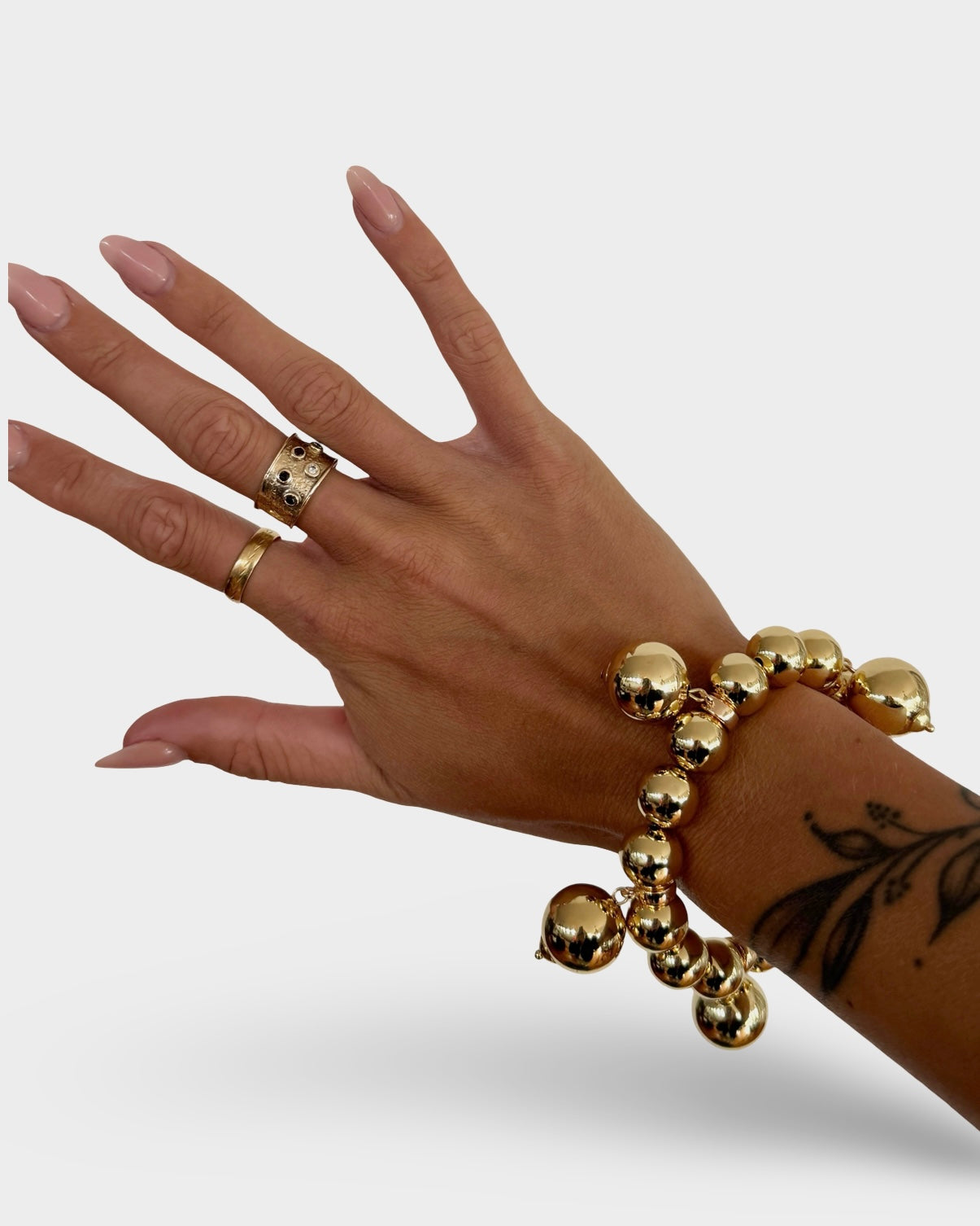 Charmed life gold multi drop charm bracelet