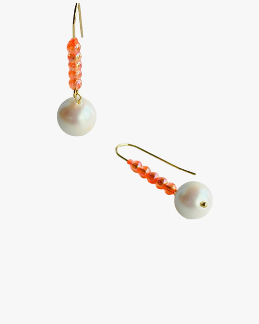 Colour pop pearl earrings in iridescent apricot
