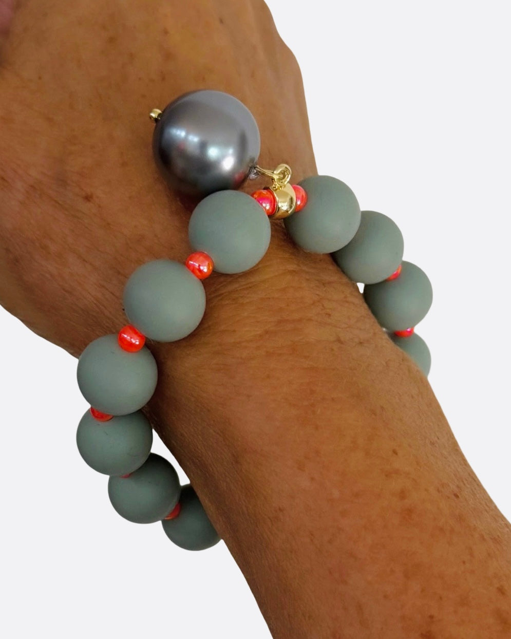 Beau green grey, orange + pearl charm bracelet