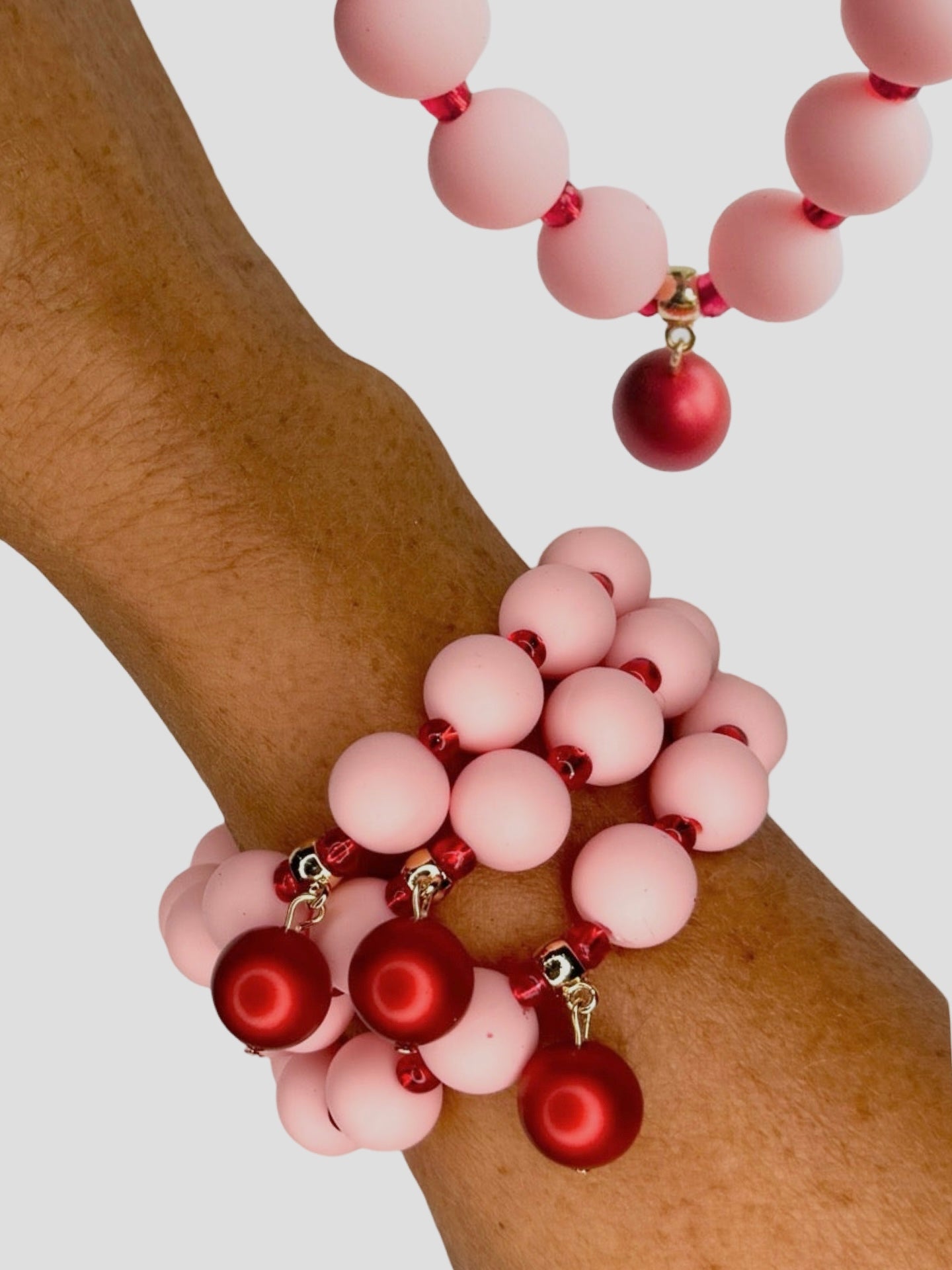 Beau pink + red beaded charm bracelet