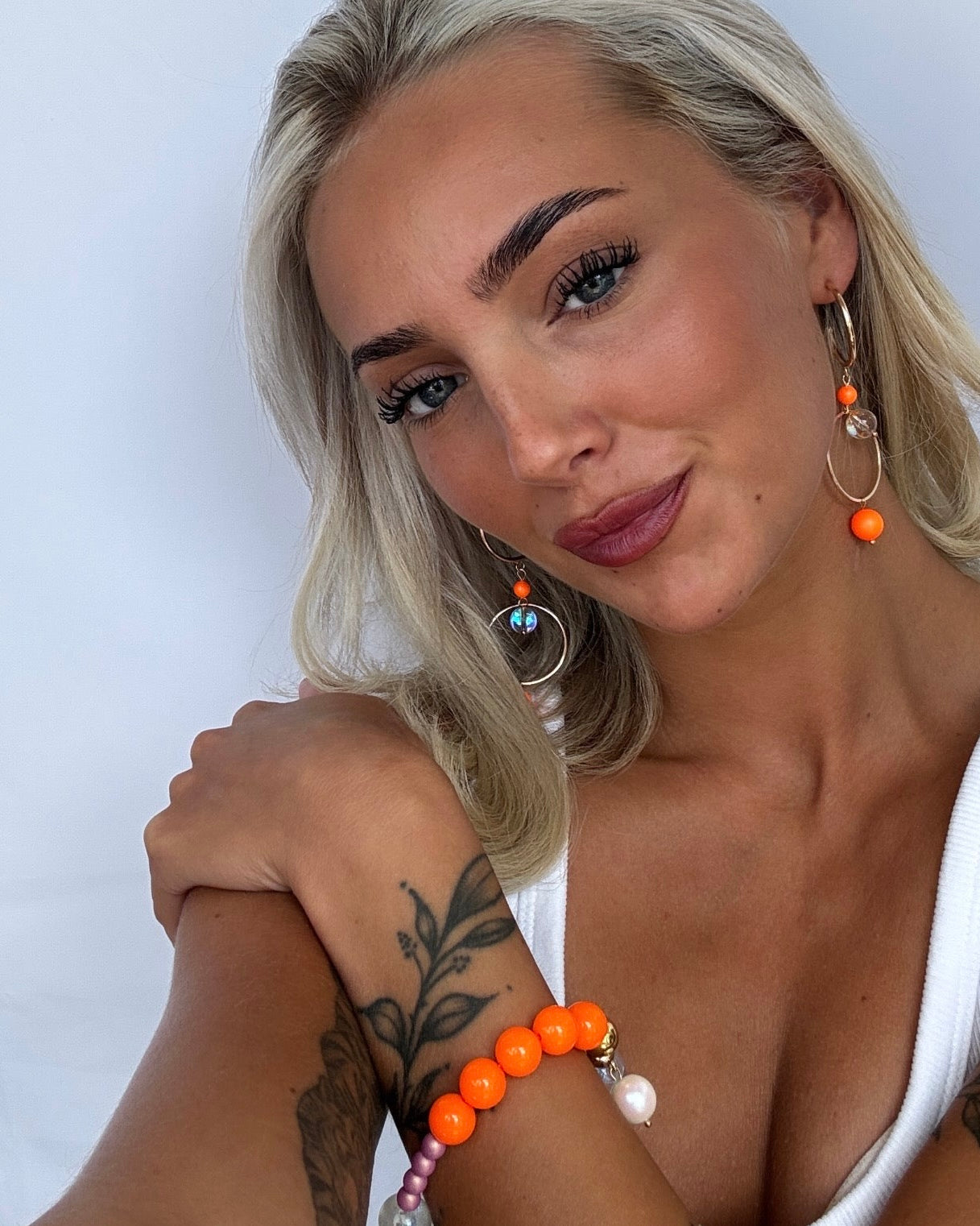 Suki neon orange pop Crystal hoop earrings