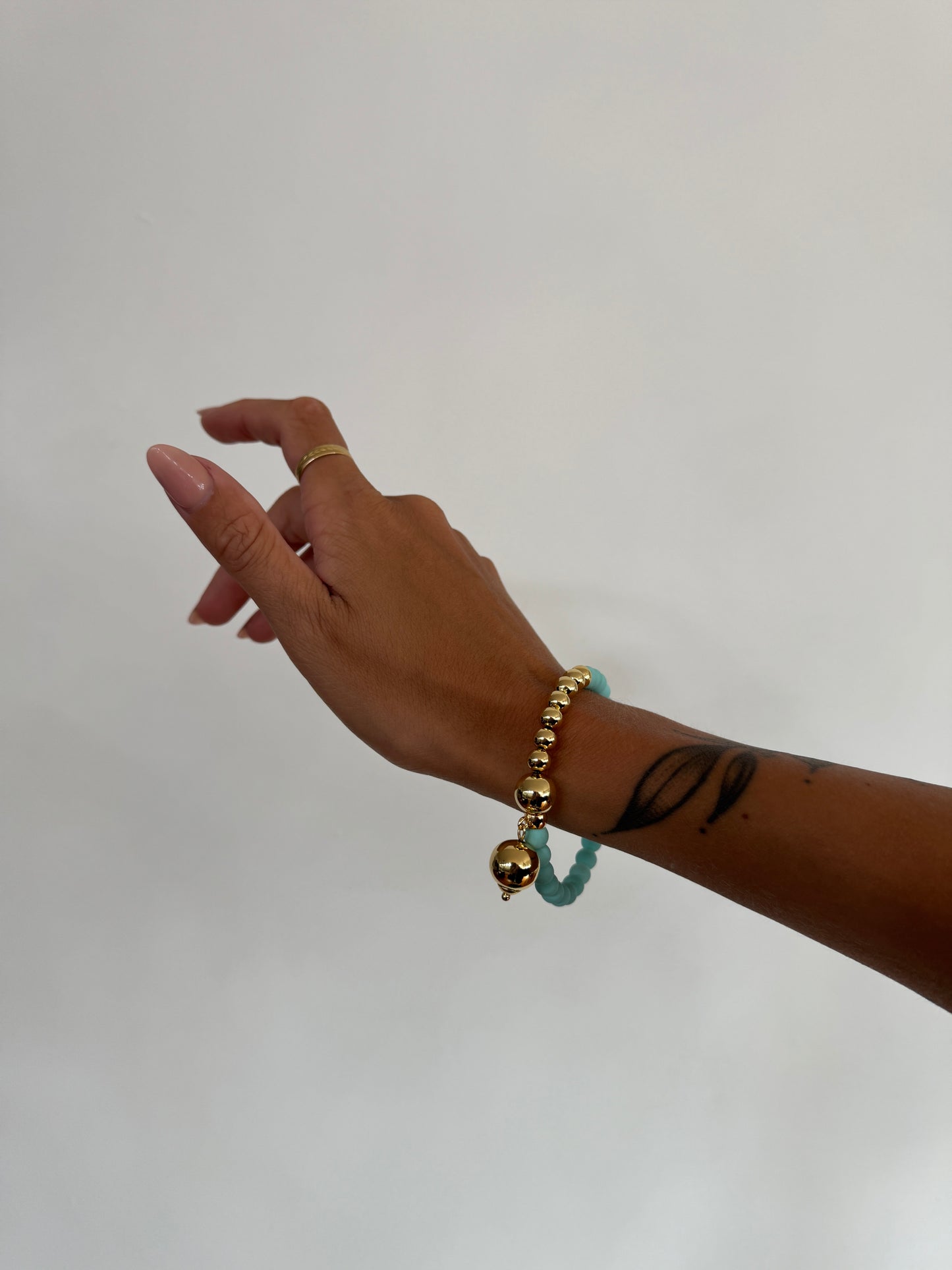 Fifi bijou seafoam crystal gold, drop gold charm bracelet
