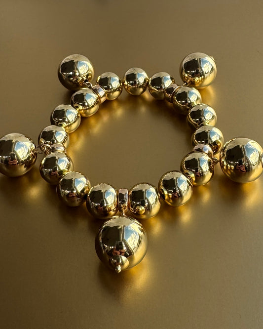 Charmed life gold multi drop charm bracelet