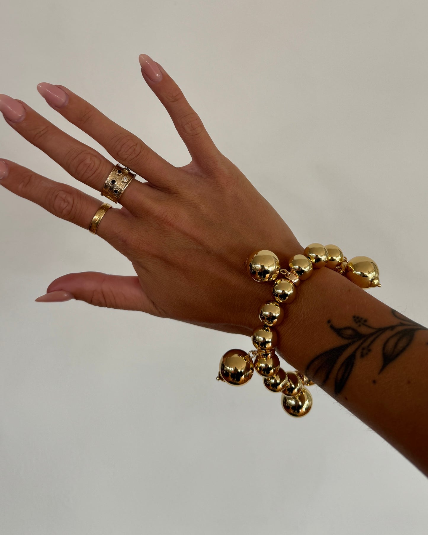 Charmed life gold multi drop charm bracelet