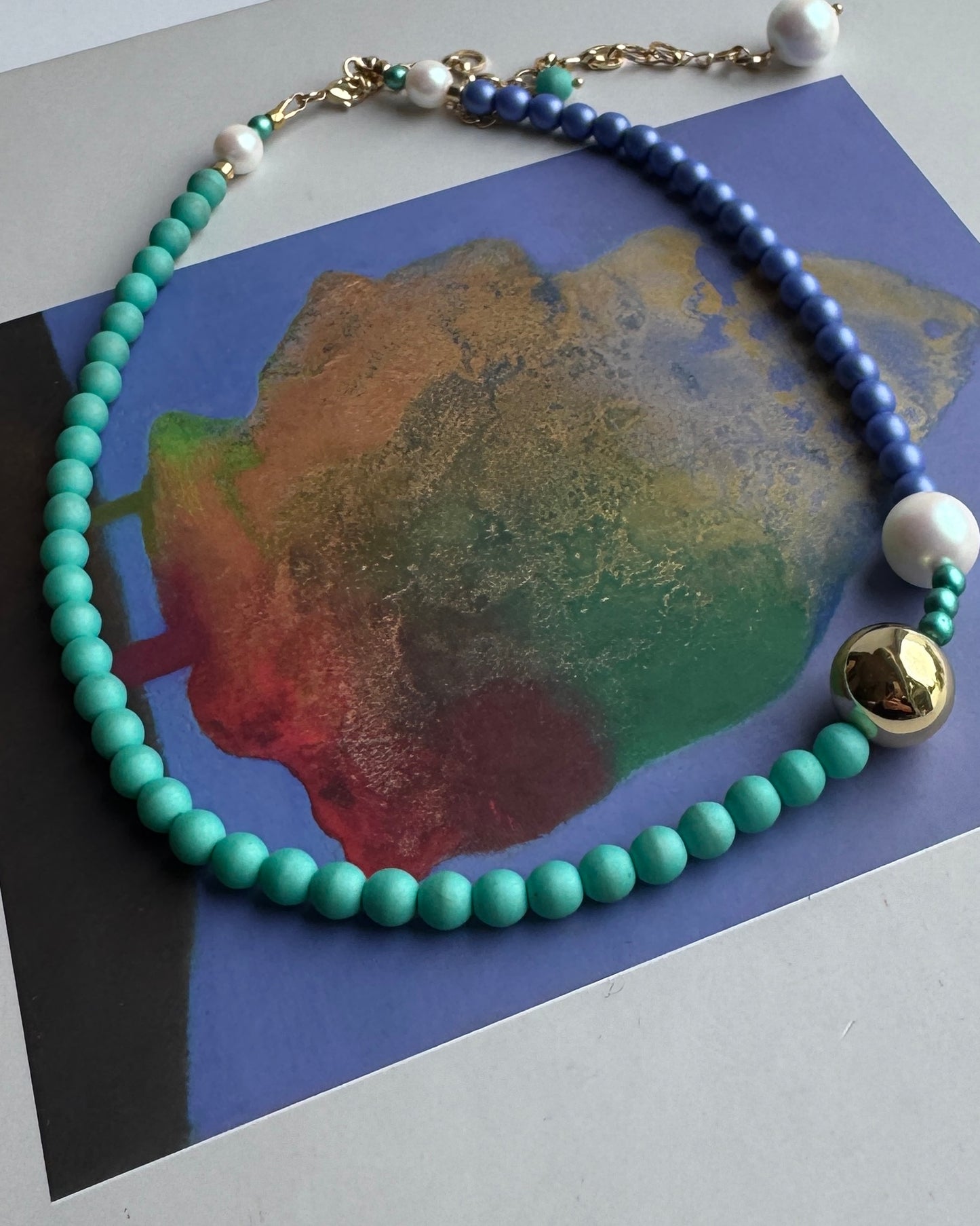 Petallic blue ocean crystal gold multi wear necklace