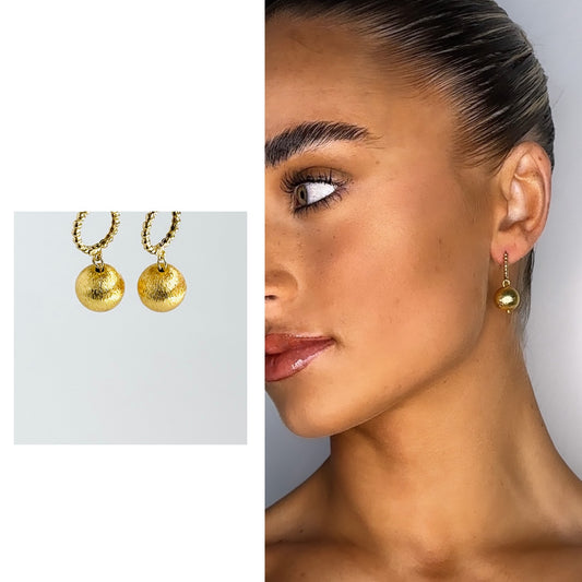 Zaina gold huggie earrings