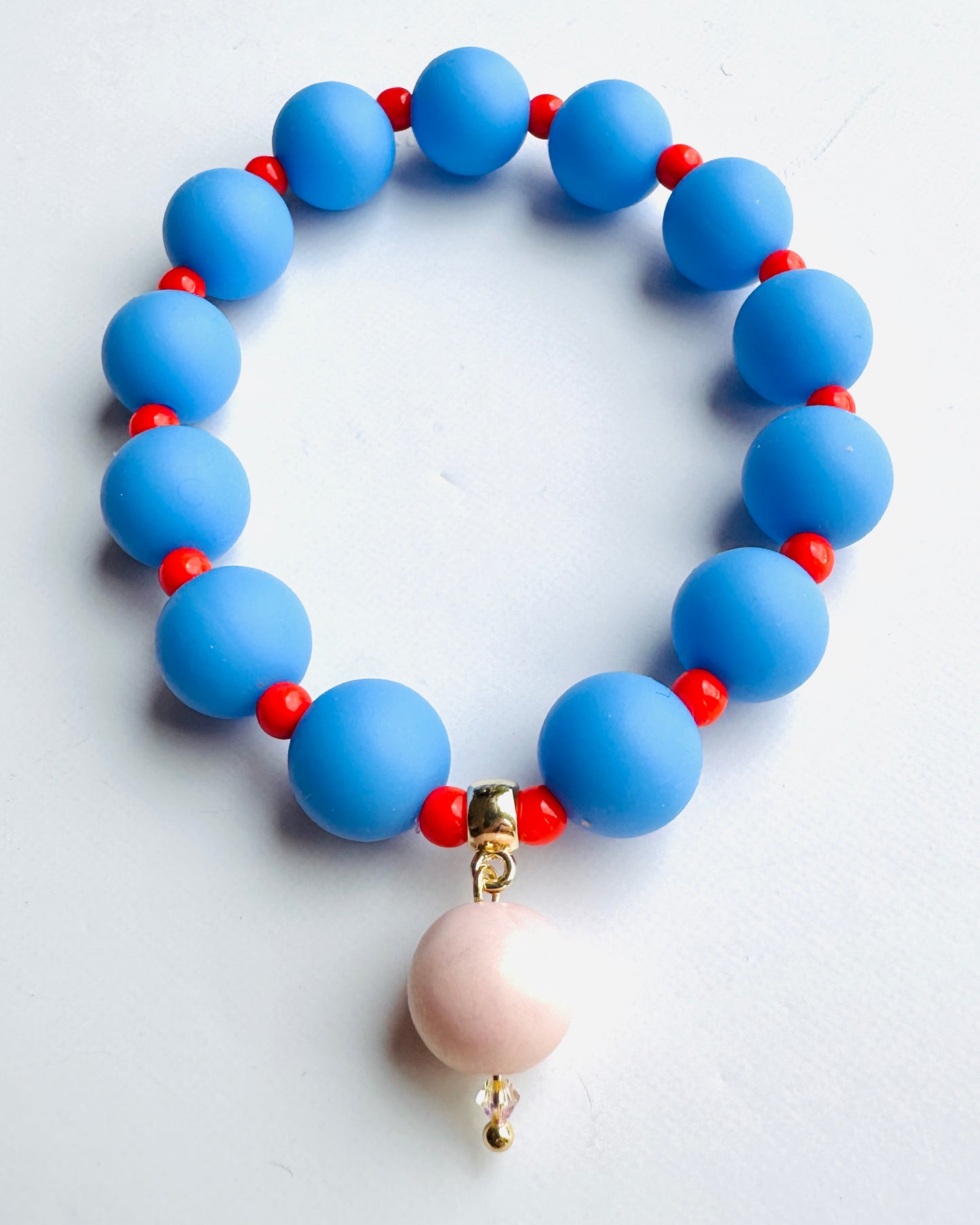 Beau bracelet in bright blue + orange, soft pink pearl charm