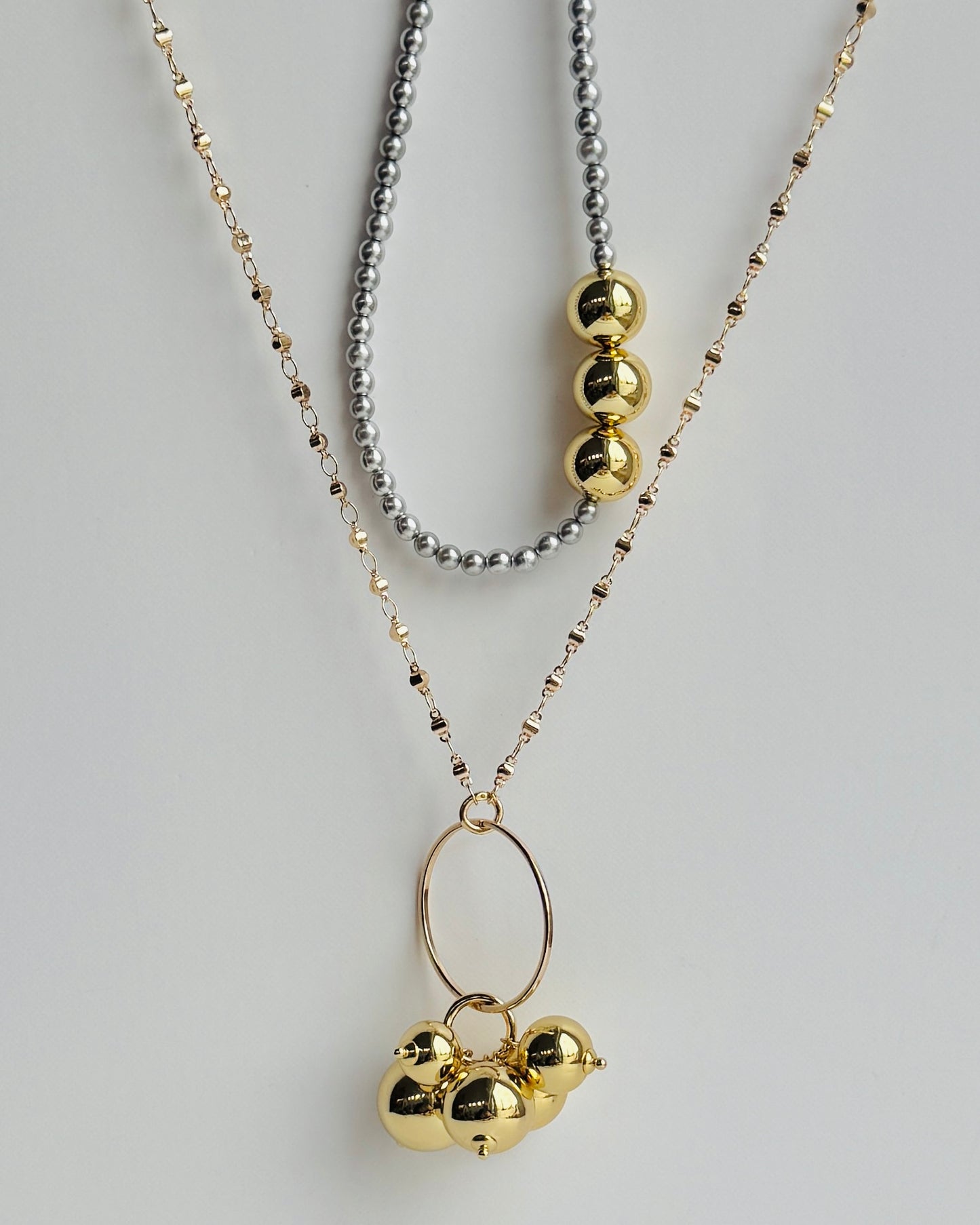 Gayle long drop gold beaded pendant necklace