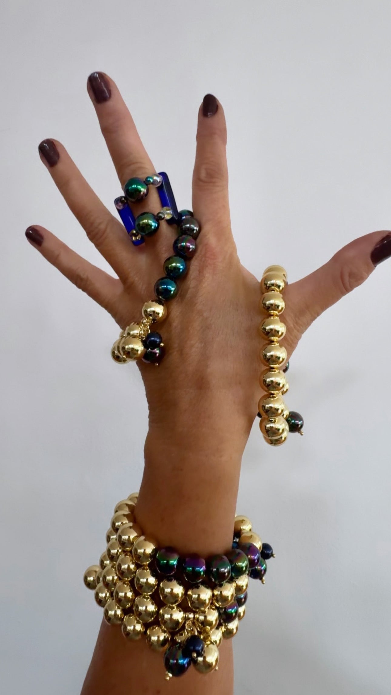 Bambi gold + iridescent navy black multi charm bracelet