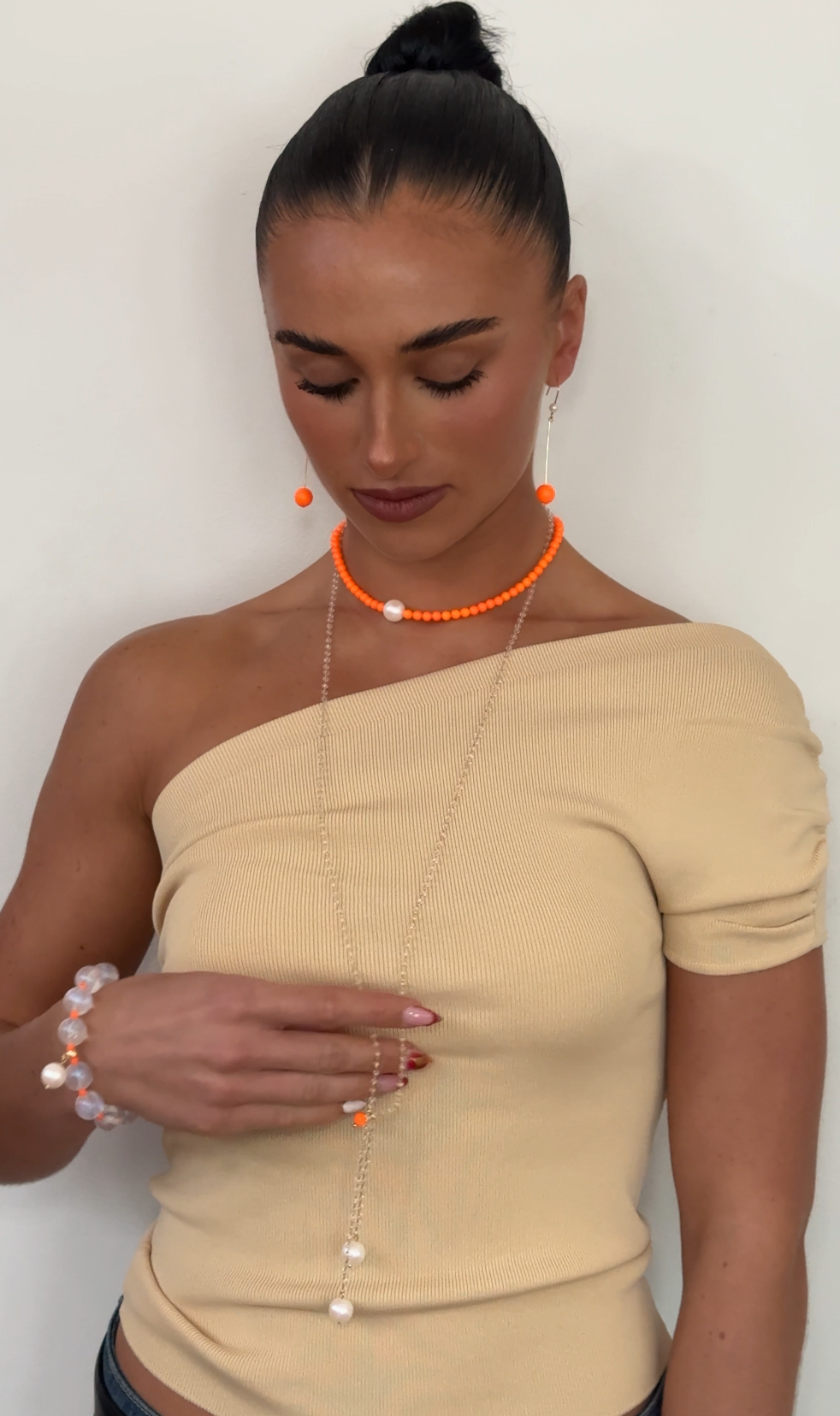 Lia multi wear white pearl with a hint of neon orange multi wear necklace