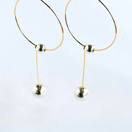 Tina gold + silver drop hoops