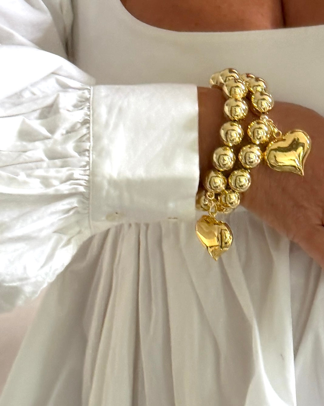 Gold bead bracelet with oversized gold heart charm by LOVE Beth