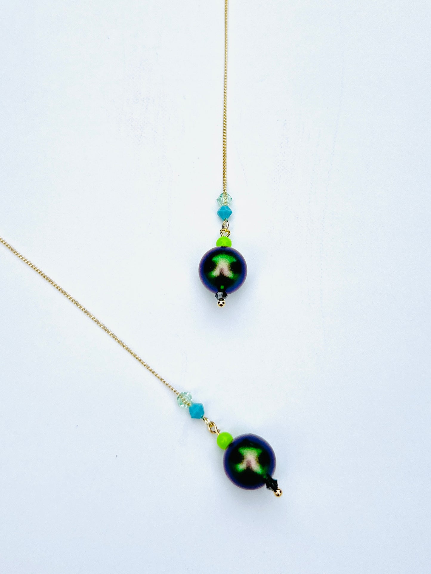 Petra Iridescent deep green + crystal threader earrings