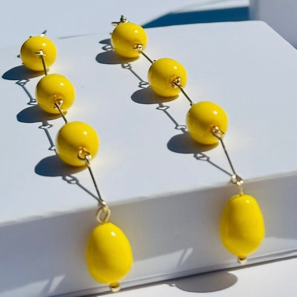 Double raindrop earrings in buttercup yellow