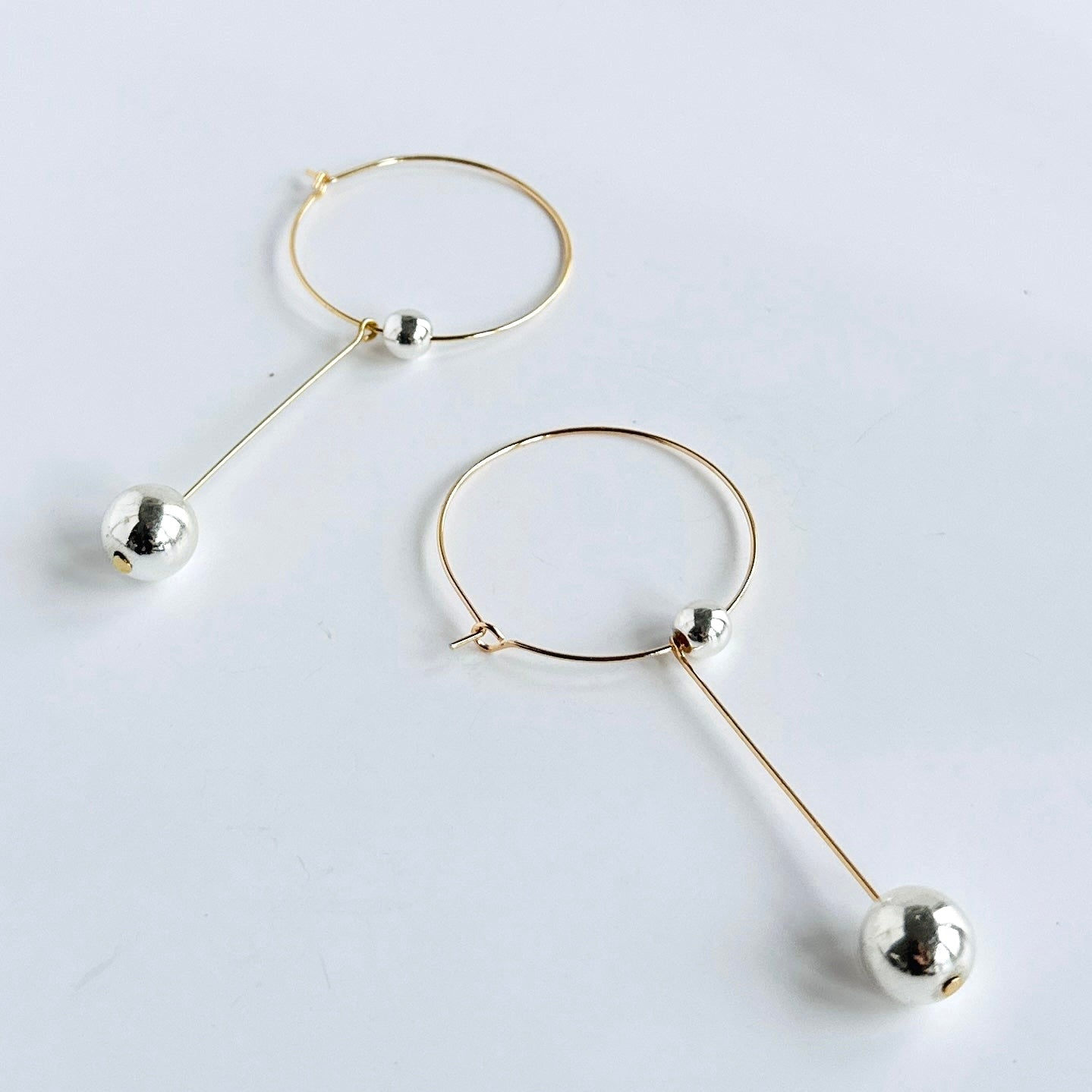 Tina gold + silver drop hoops