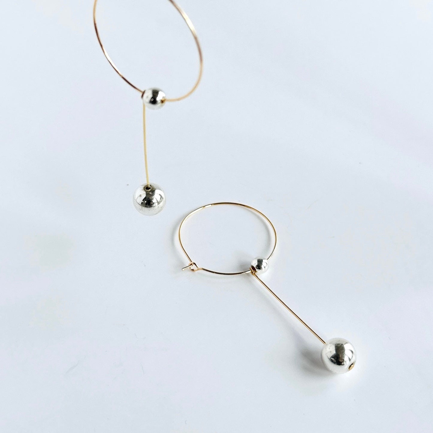 Tina gold + silver drop hoops