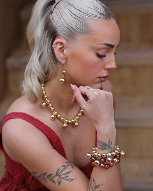 Lula drop gold earrings