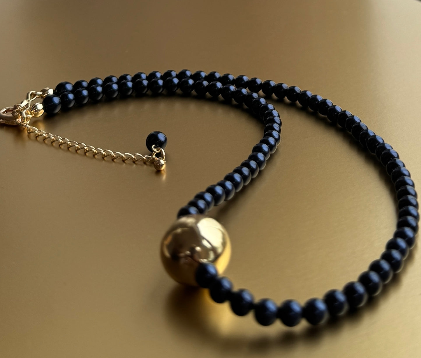 Gilda deepest navy + gold beaded necklace