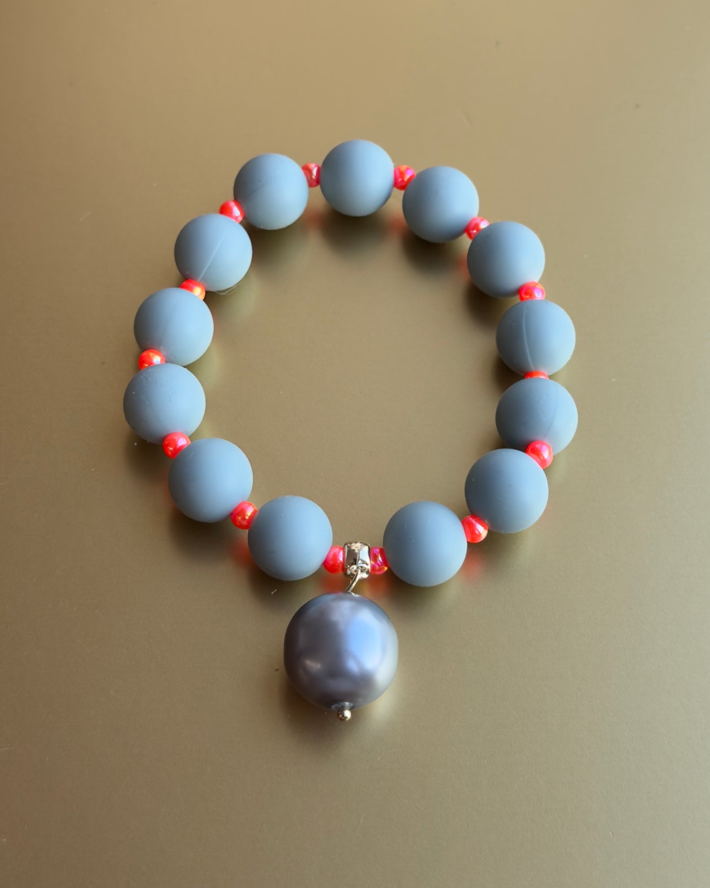 Beau green grey, orange + pearl charm bracelet