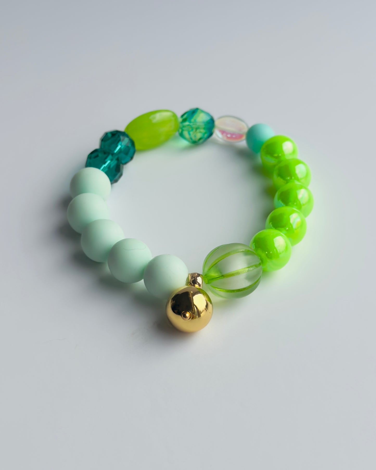 Key lime pie faded mint, green + lime beaded bracelet, gold charm