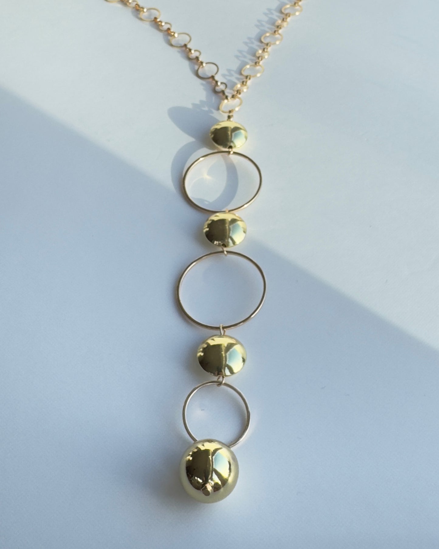 Delphine long drop pendant necklace