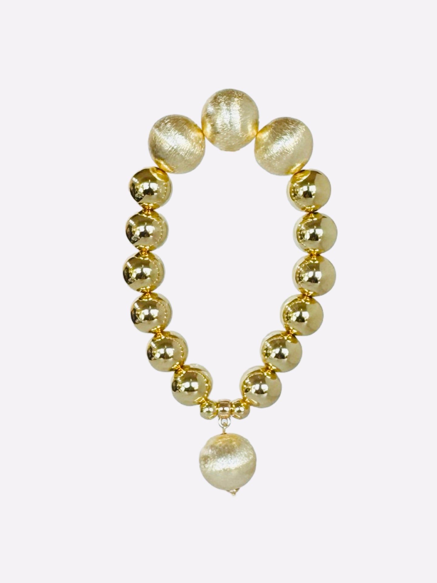 Pippa pie soft gold, gold beaded drop charm bracelet
