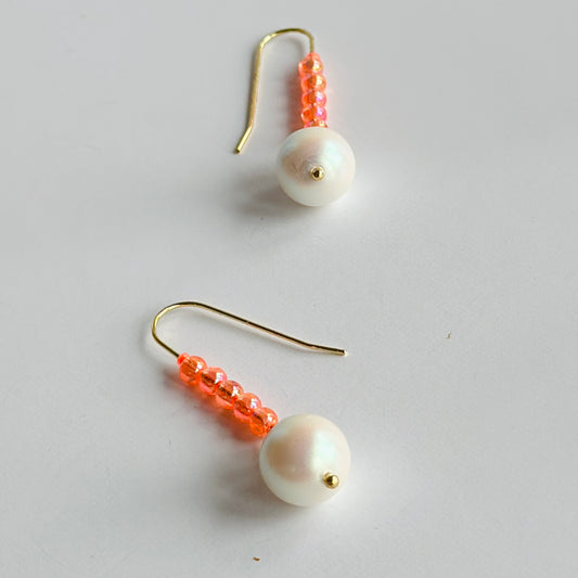 Colour pop pearl earrings in iridescent apricot