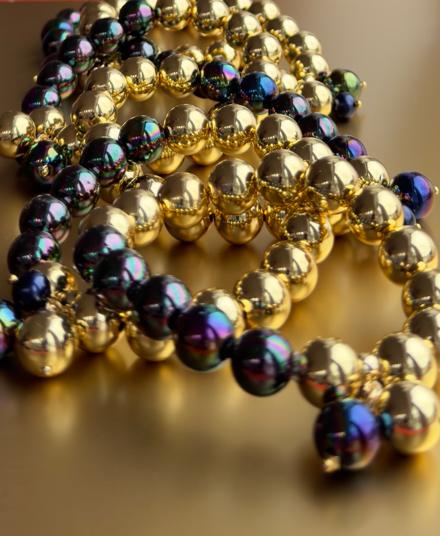 Bambi gold + iridescent navy black multi charm bracelet