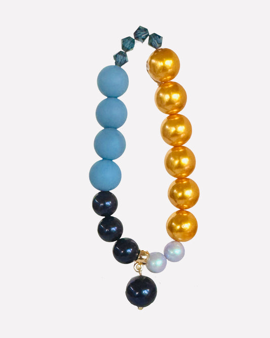 Golden crunch, deepest navy squeezy crystal, crystal pearl beaded bracelet, crystal pearl charm