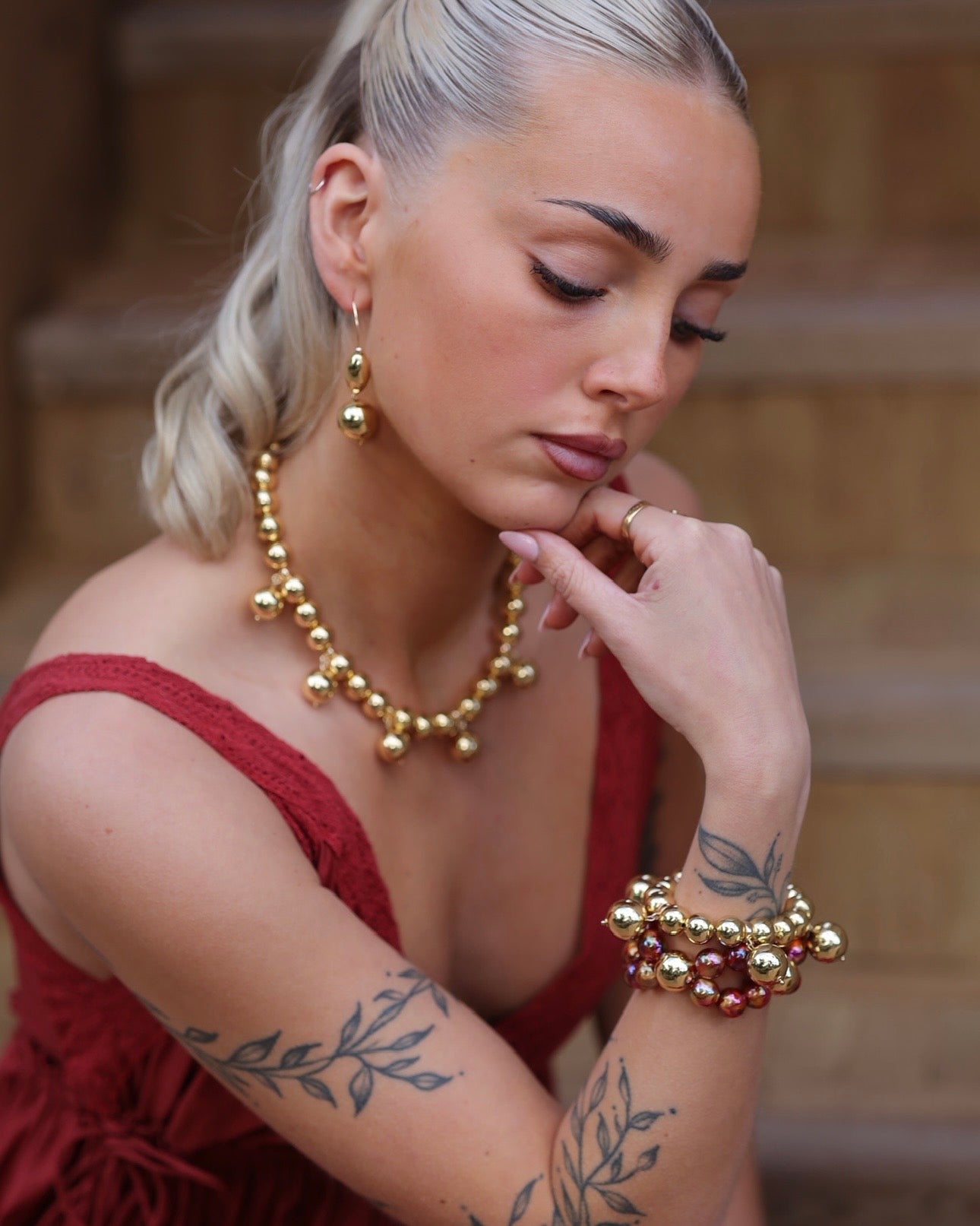 Nellie gold charm necklace