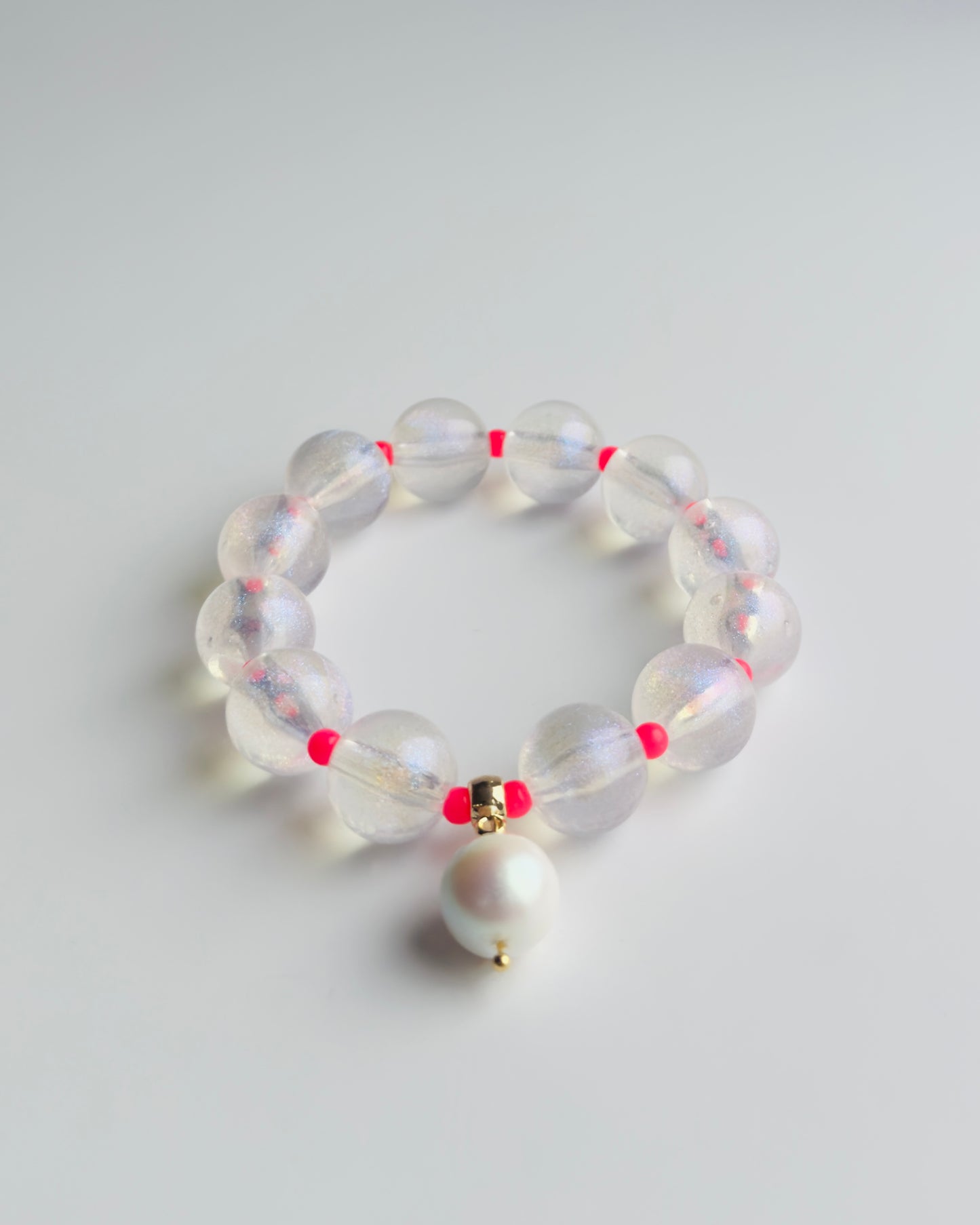 Pop icicle white + neon pink beaded bracelet, white pearl charm