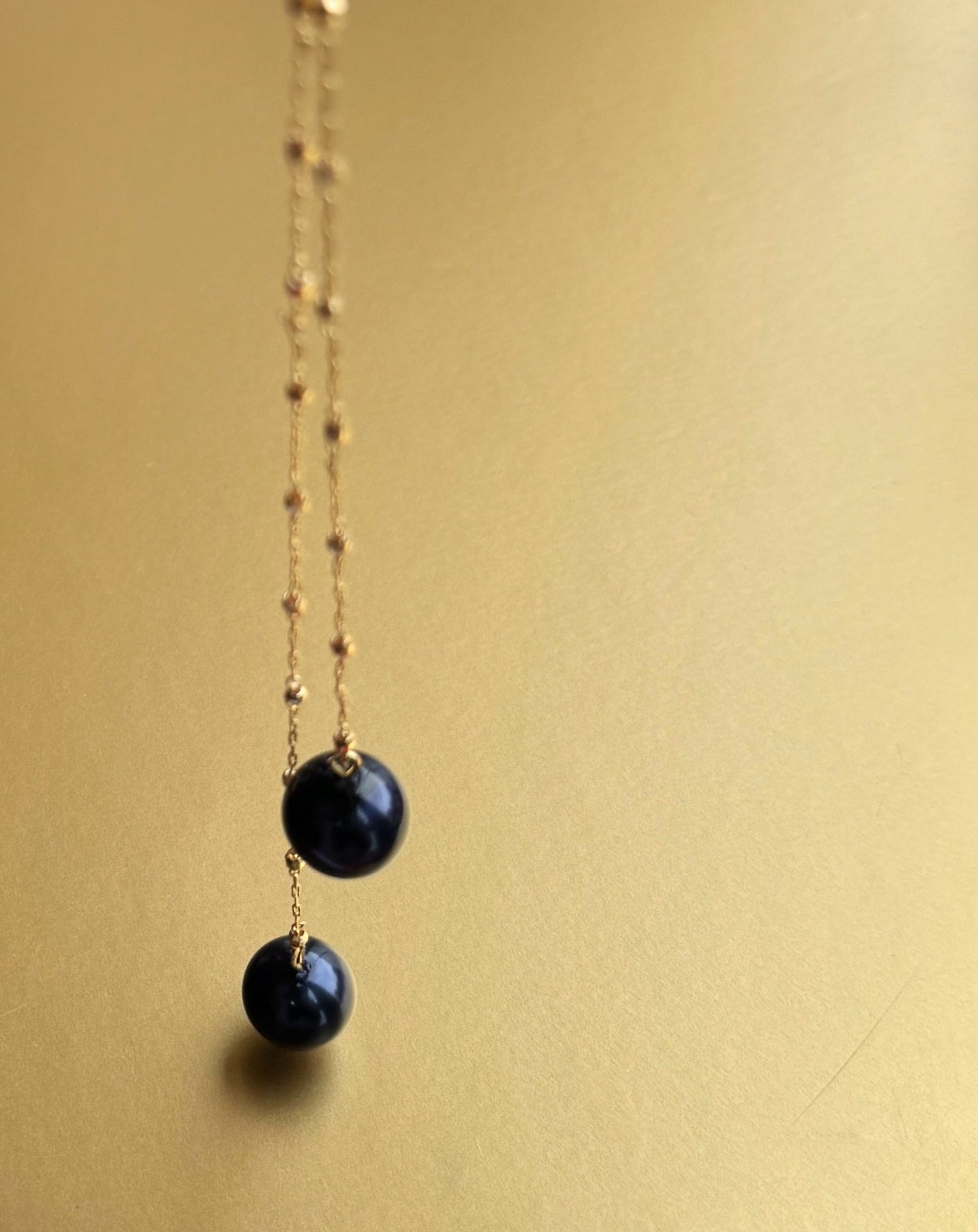 Trinny Navy haze pearl double drop necklace