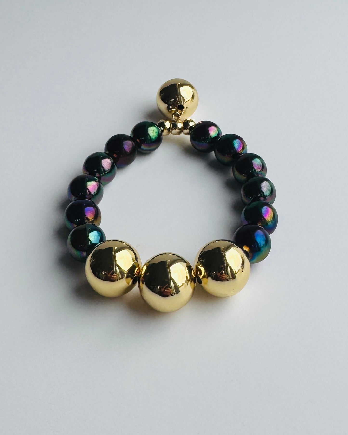 Honey glow deep navy + gold drop large ball charm bracelet