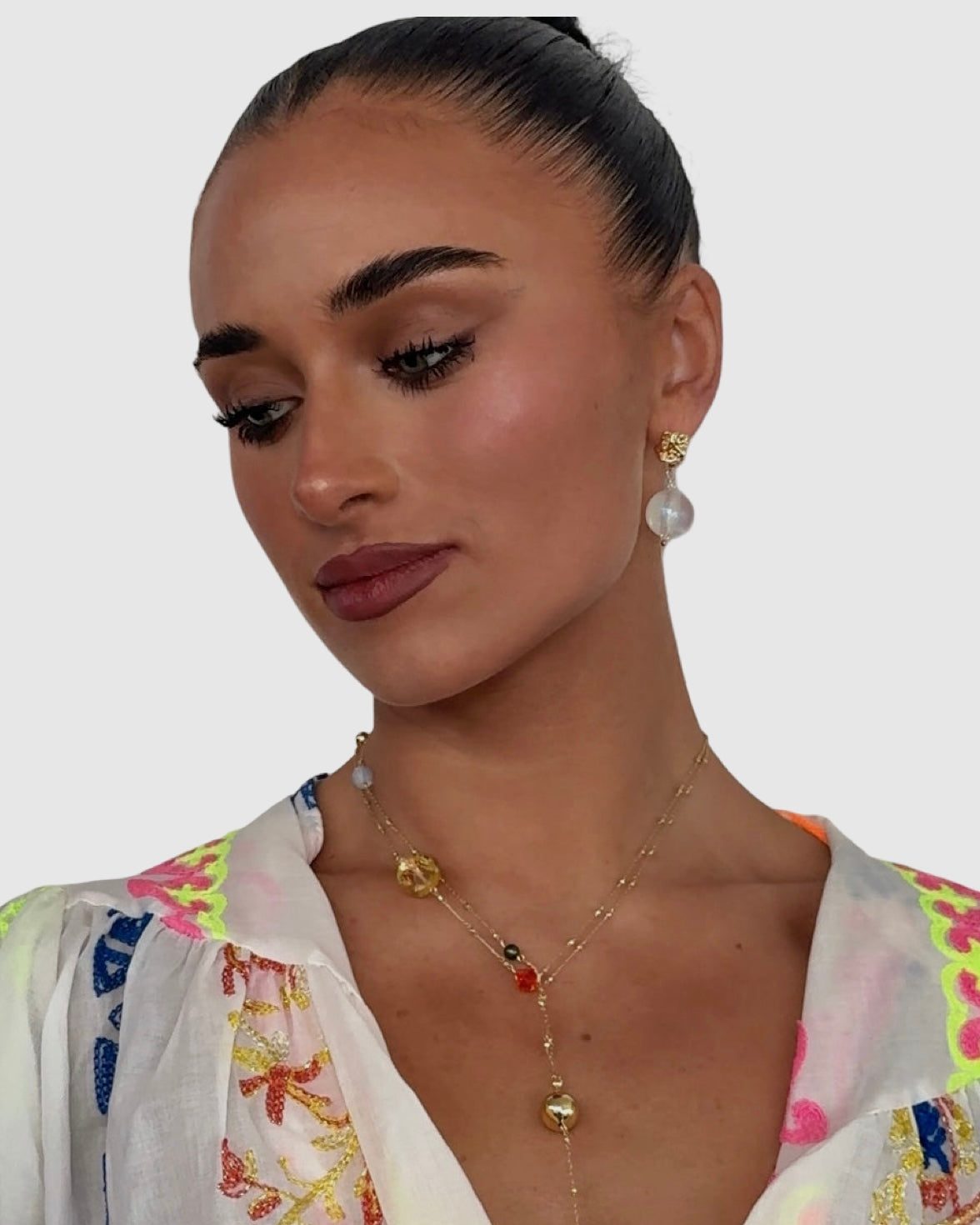 Byron iridescent white bead + gold earrings