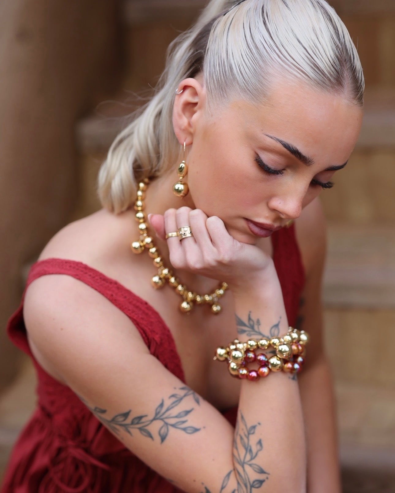 Nellie gold charm necklace