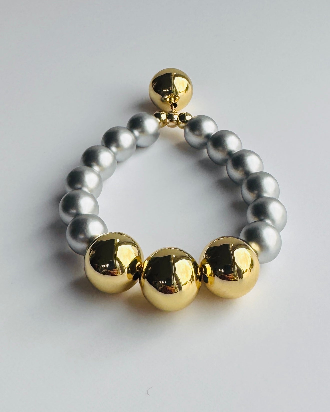 Honey glow Matt silver + gold beaded bracelet, gold charm