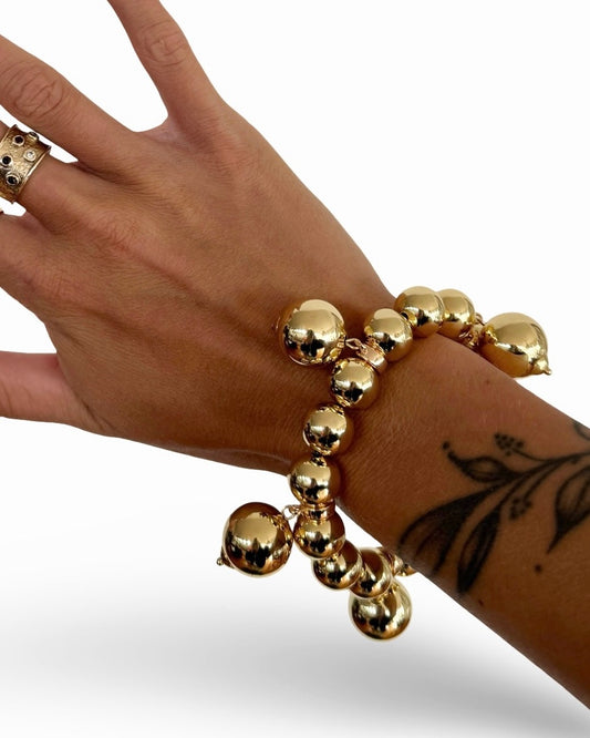 Charmed life gold multi drop charm bracelet