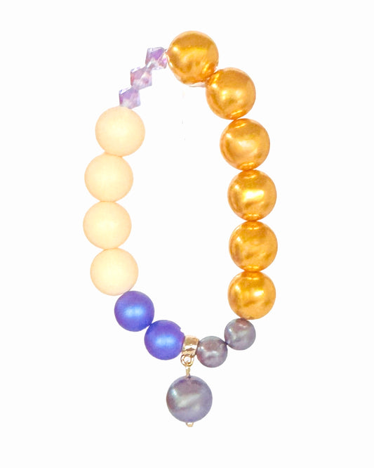 Golden crunch, iridescent purple  squeezy crystal, crystal pearl beaded bracelet, crystal pearl charm