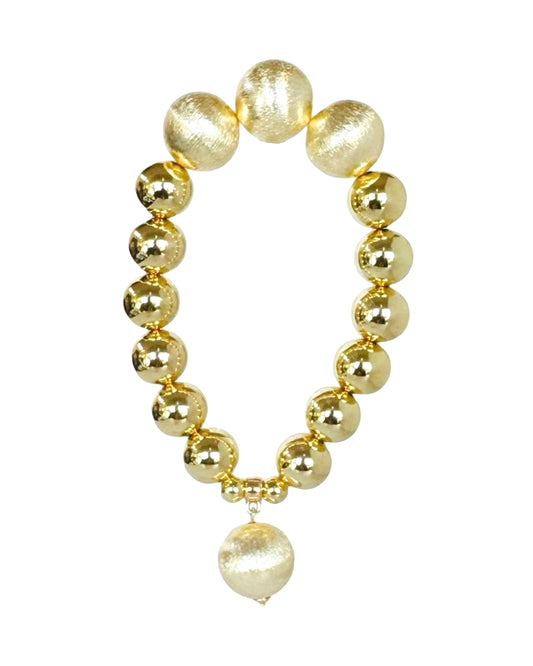 Pippa pie soft gold, gold beaded drop charm bracelet