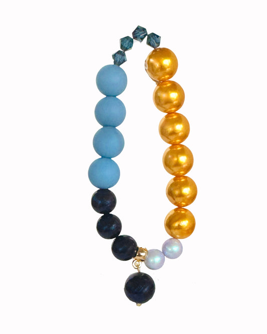 Golden crunch, deepest navy squeezy crystal, crystal pearl beaded bracelet, crystal pearl charm
