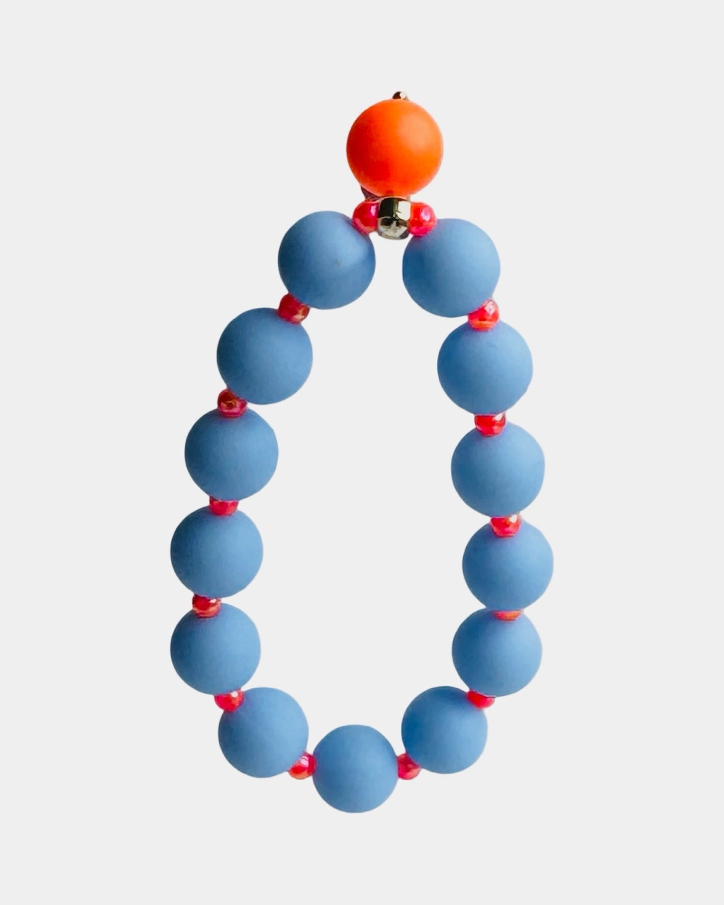 Beau bracelet in blue + neon orange, neon orange crystal pearl charm