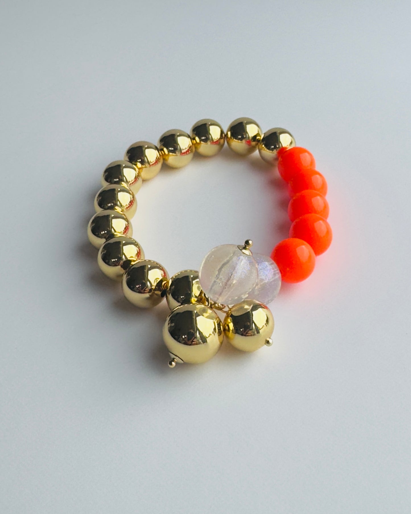 Sherbet pop bracelet in neon orange + gold